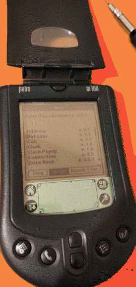 a
      photo of the m100 running and showing its information
      "Version" tab. Version 3.5.1 of the OS, or of Date Book,
      can be seen. a ClockPopup item can be seen.